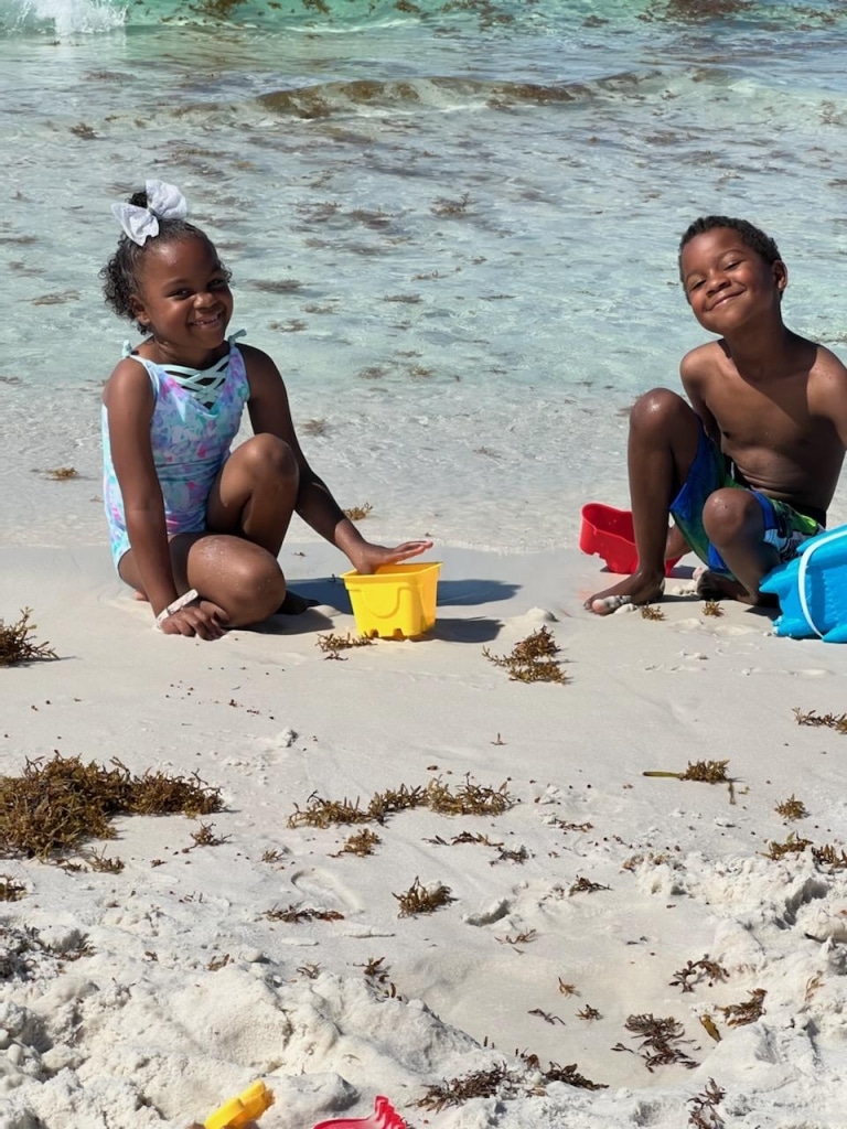 Wish Kid Imani on a beach trip with her brother
